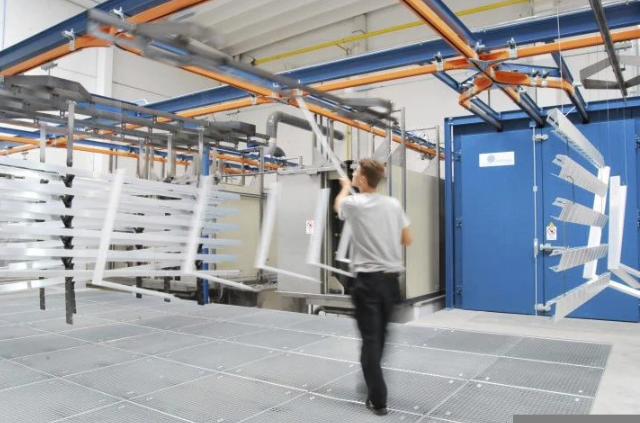 Packaging department carefully preparing equipment for international shipment