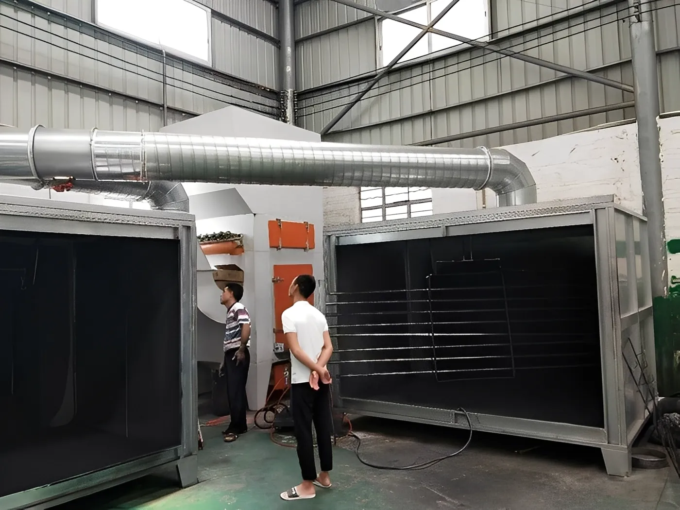 Operator view inside powder coating booth