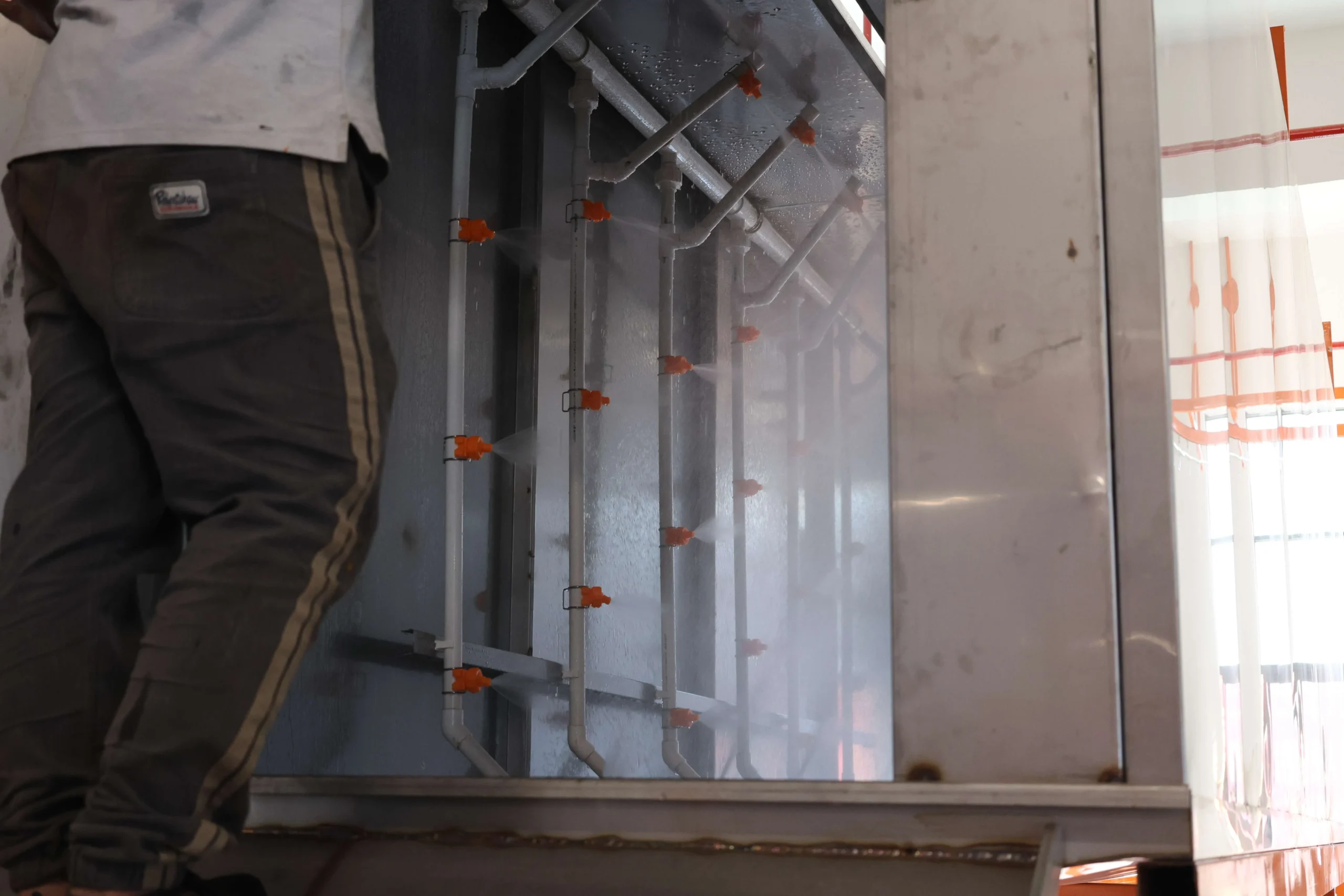Pretreatment spray washing