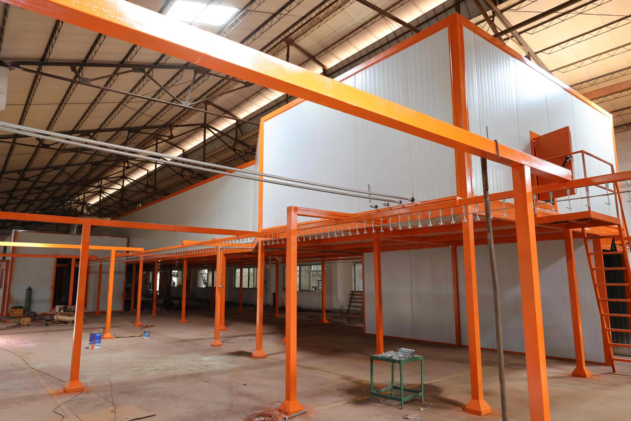 Immersion spray pretreatment system for powder coating