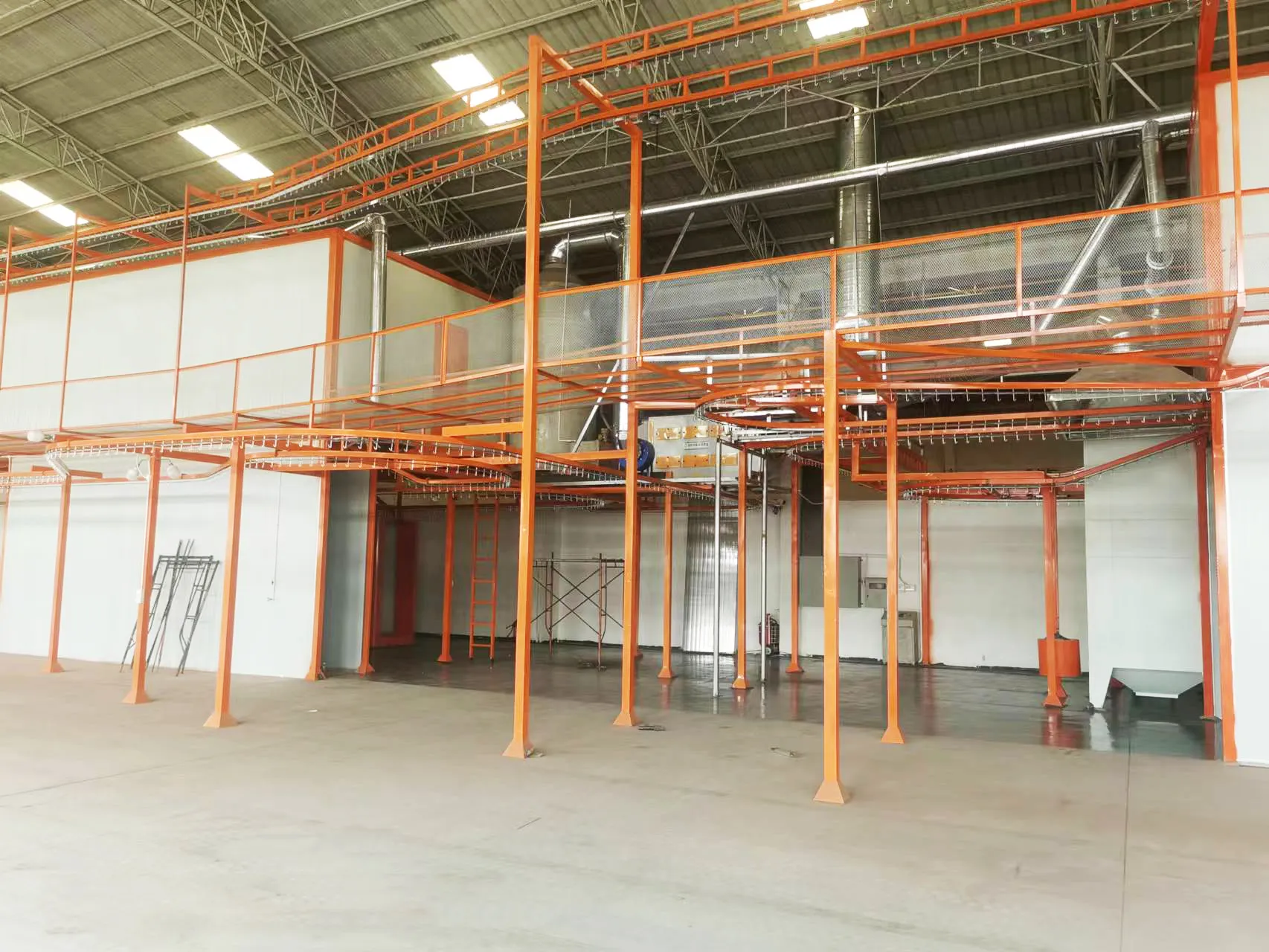 Steel support array in automatic powder coating workshop