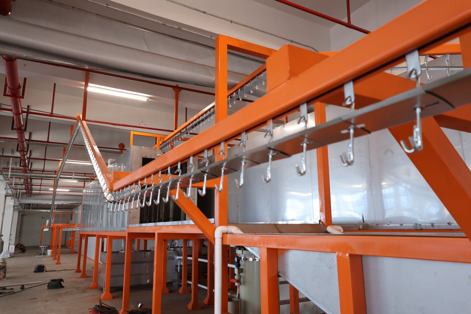 Complete powder coating line installation at customer facility